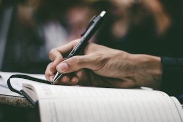 Hand Writing in Notebook
