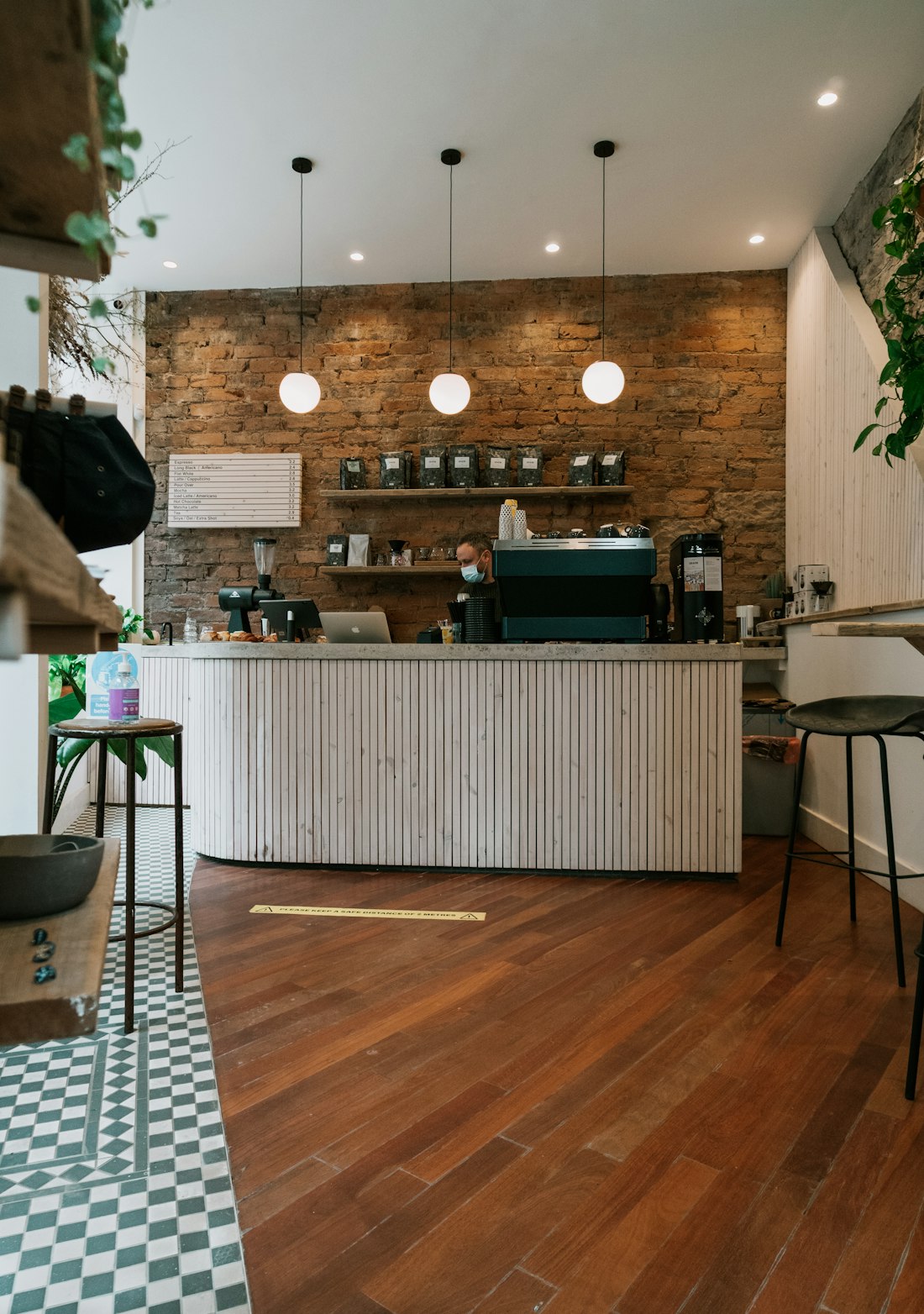 Café Counter with Brick Wall and Pendant Lights